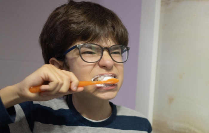 Using A Toothbrush That Is Too Hard